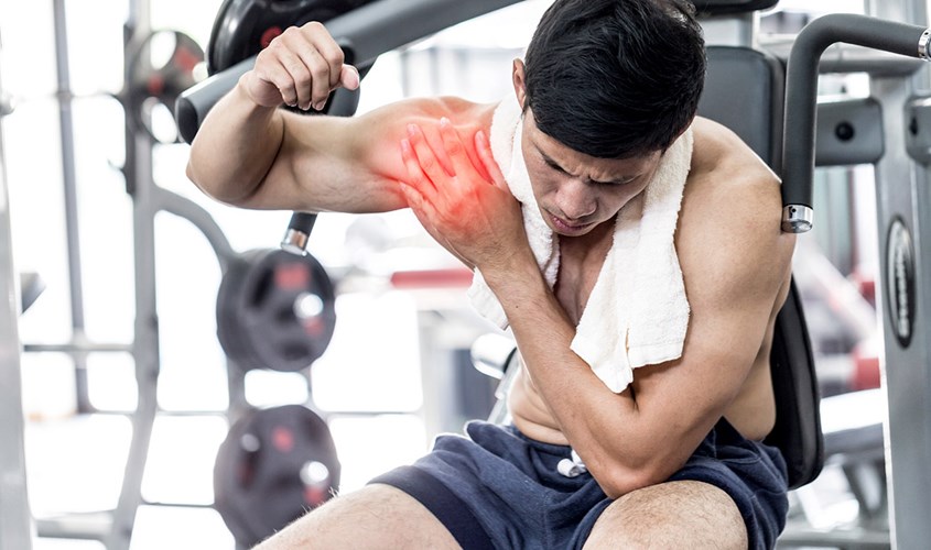 Man Working Out With A Shoulder Injury